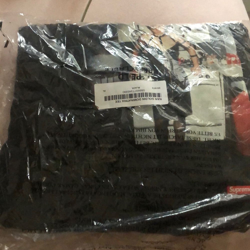 Nan golden supreme black tee brand new in the bag